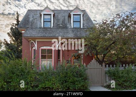 Sunrise over the ca: 1891 Frank and Mary Harney historic brick house in Helena, Montana.  The home is in the South-Central Historic District of Helena Stock Photo