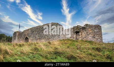 The image is of the 12th century ruin of Castle Roy fortress near the ...