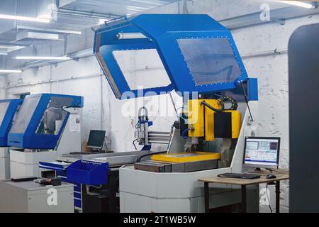 Perm, Russia - July 13, 2023: industrial workshop with metalworking machine tools in blue colors Stock Photo