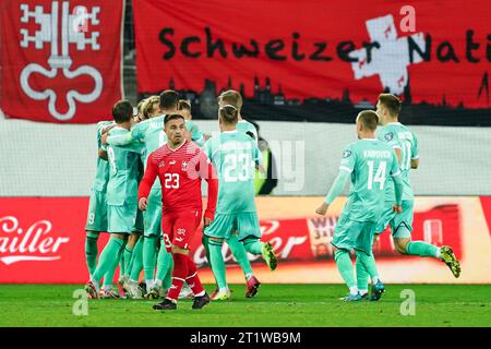 St. Gallen, St. Gallen. 15th Oct, 2023. St. Gallen, Switzerland, October 15th 2023: Denis Polyakov (5 Belarus) celebrates with teammates after scoring his team's second goal and Xherdan Shaqiri (23 Switzerland) looks dejected and disappointed during the UEFA European Qualifiers foocst<tball match between Switzerland and Belarus at Kybunpark in St. Gallen, Switzerland. (Daniela Porcelli/SPP) Credit: SPP Sport Press Photo. /Alamy Live News Stock Photo