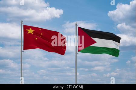 Palestine and Gaza Strip and China flags waving together on blue cloudy sky Stock Photo