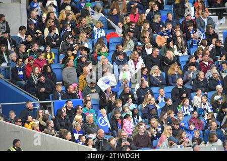 Brighton UK 15th October 2023 -  Fans  during the Barclays  Women's Super League football match between Brighton & Hove Albion and Tottenham Hotspur at The American Express Stadium (Editorial Use Only) : Credit Simon Dack /TPI/ Alamy Live News Stock Photo
