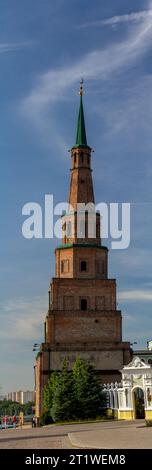 Kazan, Russia - August, 20, 2018: The leaning Suyumbike Tower and the territory of the Kazan Kremlin on a sunny spring day with clouds. Stock Photo