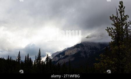 Cloud covered mountain peaks Stock Photo