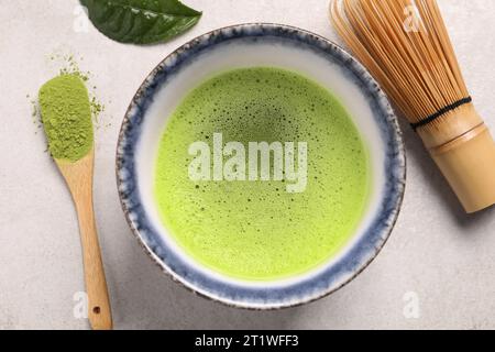 Flat lay composition with matcha tea on light gray table Stock Photo