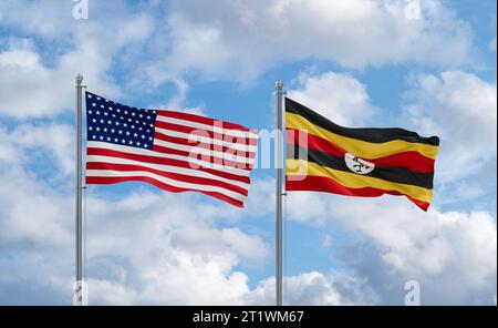 USA and Uganda flags waving together in the wind on blue cloudy sky ...