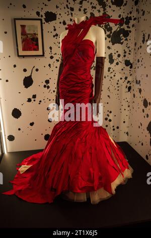 Emma Stone's Flame Dress from Cruella 2021 at the Disney100 exhibition  Stock Photo - Alamy
