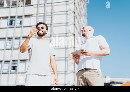 A Successful Collaboration of Modern Architects and Engineers in Urban Construction Project Stock Photo