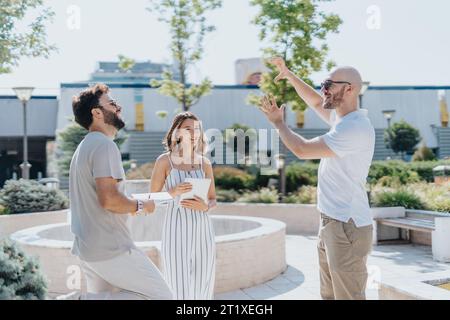 Successful Urban Architecture Team Collaborating on Building Project in City Area Stock Photo
