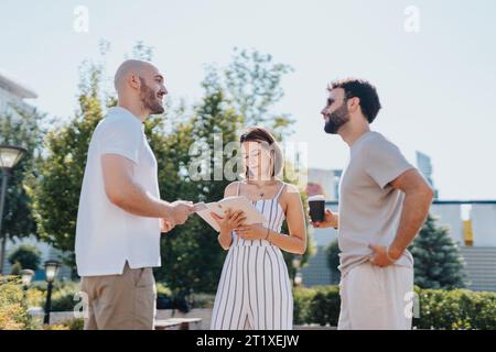 Successful Architects Collaborating on Urban Construction Project Stock Photo