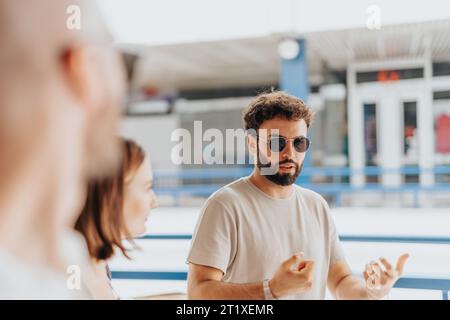 Successful Young Adult Specialists Collaborating on New Project for Business Growth Stock Photo
