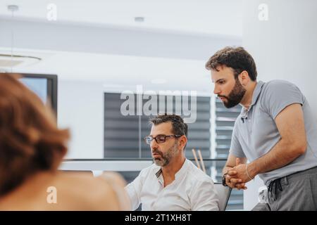 Efficient Business Partners Analyzing Reports for Profitable Growth Stock Photo