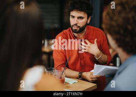 Creative Architects and Engineers Collaborating on Successful Urban Planning Project. Stock Photo