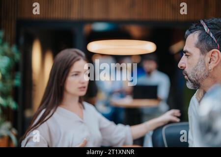 Business Professionals Discussing Strategies and Project Development for Better Efficiency and Profit Growth Stock Photo