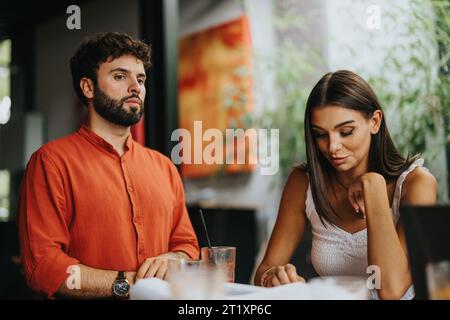 Executives and investors join, showcasing successful cooperation in project development and urban planning. Stock Photo