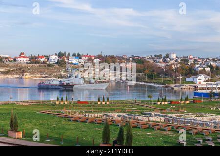 Russian warship goes at Sevastopol bay on a sunny day, Crimea Stock Photo