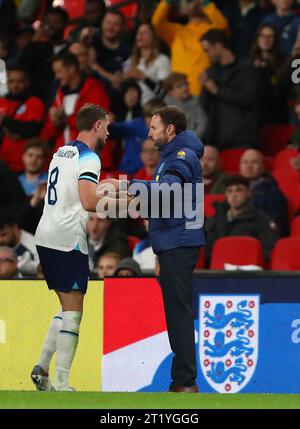 Manager of England, Gareth Southgate embraces Jordan Henderson of England after he is substituted to booing England fans - England v Australia, International Friendly, Wembley Stadium, London, UK - 12th October 2023. Stock Photo