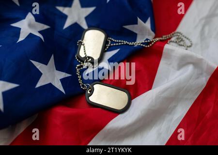 Soldier's token on American flag background Stock Photo