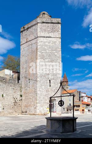 Zadar, Croatia - April 15 2019: The 'Kapetanova kula' (Captain's tower) is located in Five Wells Square in the old town. Stock Photo