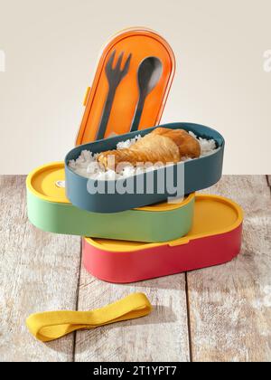 colored lunch boxes stand on a wooden table Stock Photo