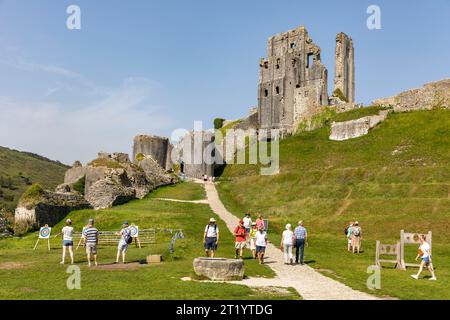 Corfe Castle stone ruins on the Isle of Purbeck in Dorset, an 11th century castle built by William the Conqueror,England,autumn 2023 Stock Photo