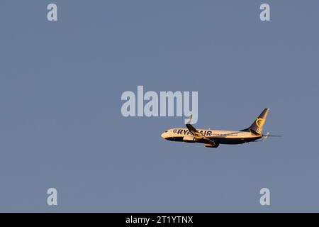 Cologne, Germany - August 26, 2023: a Boing 737-8AS of Ryanair in climb flight short after take-off. Ryanair is an irish low-cost airline. Stock Photo