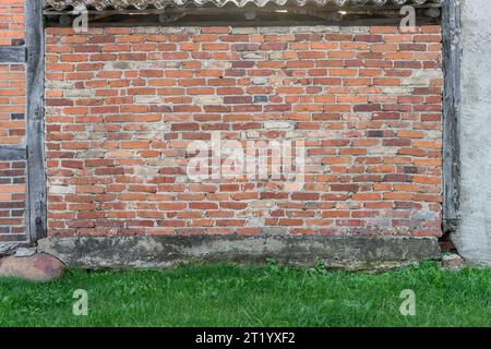 Background with wall made of red bricks Stock Photo