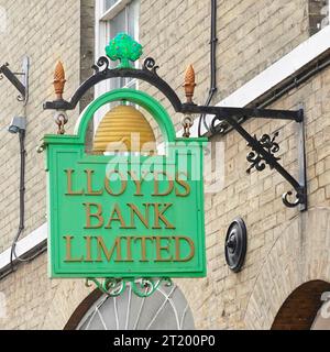 Historial unusual elaborate Green Lloyds Bank historic hanging sign  wrought iron bracket Buttermarket Bury St Edmunds Suffolk East Anglia England UK Stock Photo