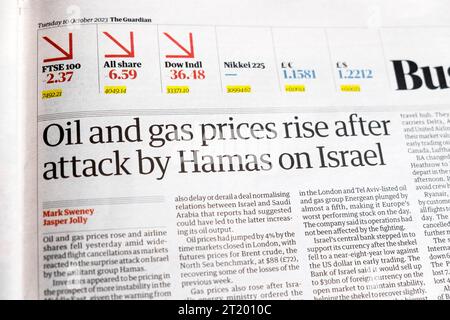 'Oil and gas prices rise after attack by Hamas on Israel'  Guardian newspaper headline Israeli war Tel Aviv company Energean article10 October 2023 UK Stock Photo