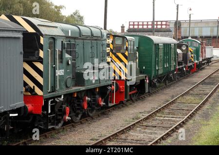 Preserved steam and diesel shunting locomotives and rolling stock stabled at Barrow Hill Roundhouse, UK. Stock Photo