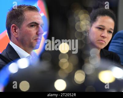 16 October 2023, Hesse, Frankfurt/Main: Philipp Lahm (l), UEFA EURO 2024 tournament director, and Celia ·a·i·, UEFA EURO 2024 ambassador, speak during a press conference on EURO 2024 at the Frankfurt stadium. Photo: Arne Dedert/dpa Stock Photo