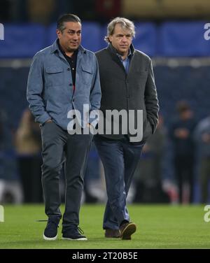 Todd Boehly Owner of Chelsea & Chelsea Director, Behdad Eghbali walk acrid the Stamford Bridge pitch after visiting the players dressing room after the loss. - Chelsea v Real Madrid, UEFA Champions League, Quarter-finals, 2nd leg, Stamford Bridge Stadium, London, 18th April 2023. Editorial Use Only - DataCo restrictions apply Stock Photo