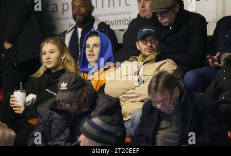 David Beckham, Cruz Beckham & Tana Holding. - Brentford B v Arsenal U21, Premier League Cup, Quarter final, VBS Community Stadium, Sutton, UK - 13th March 2023. Editorial Use Only - DataCo restrictions apply, Editorial Use Only. Stock Photo