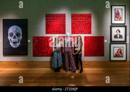 London, UK. 16th Oct, 2023. Killing Eve: A Halpern Jacket and Trousers worn by Villanelle's stunt double for the season 3 finale of the BBC drama 'Killing Eve', 2020. Estimate: £1,000 - £1,500 in front of Damien Hirst, The Empresses (H10), 2022, est £15,000 - £20,000 - Preview of Bonhams' Pop X Culture sale. The sale runs online on bonhams.com until Wednesday 18 October. Credit: Guy Bell/Alamy Live News Stock Photo