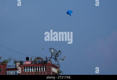 Kathmandu, Bagmati, Nepal. 16th Oct, 2023. Nepali kids fly kites in ...