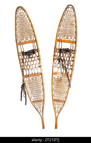 Vintage snowshoe with hardwood frame filled in with rawhide latticework isolated on a white background Stock Photo