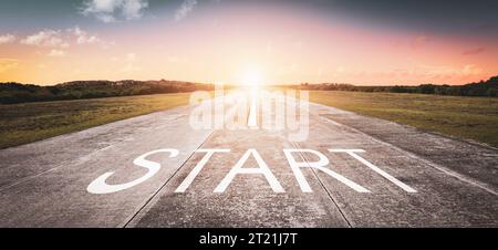 Start word written on the road. Stock Photo