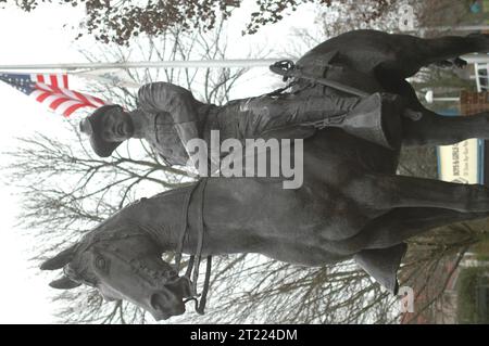 Statue of President Theodore Roosevelt in his Rough Rider Uniform on horseback located at the entrance to Oyster Bay Hamlet, NY. Subjects: Historic sites. Location: New York. Stock Photo