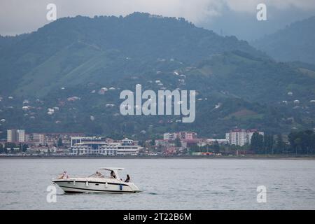 August 07, 2022. Georgia. Batumi. Motor boats on the sea against the backdrop of the Georgian mountains. Stock Photo