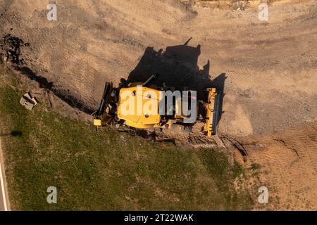 Drone photography of a highway and construction being done on it in a city during summer day Stock Photo