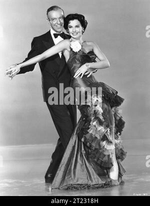 FRED ASTAIRE and CYD CHARISSE Portrait from THE BAND WAGON 1953 Director VINCENTE MINNELLI  Story and Screenplay BETTY COMDEN and ADOLPH GREEN Costumes MARY ANN NYBERG Songs HOWARD DIETZ and ARTHUR SCHWARTZ Produced by ARTHUR FREED Metro-Goldwyn-Mayer Stock Photo