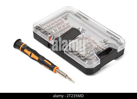 Manual mini screwdriver and set of the interchangeable bits with working parts of different shapes and sizes in special plastic case on a white backgr Stock Photo