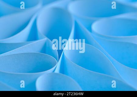 Abstract, blue paper background with smooth lines Stock Photo