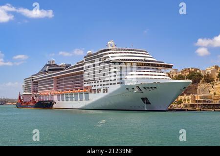 Valletta, Malta - 6 August 2023: Large cruise ship MSC Divina docked in the city's harbour Stock Photo