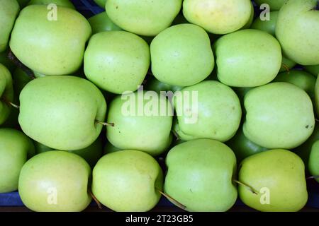Close up fresh green apples at the market Stock Photo
