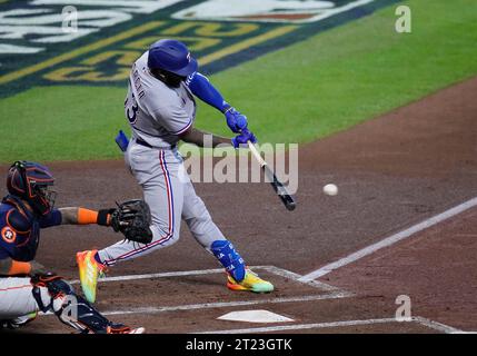 Houston, United States. 16th Oct, 2023. Texas Ranger Adolis Garcia hits an rbi-single in the first inning against the Houston Astros in game two of the ALCS at Minute Maid Park in Houston on Monday, October 16, 2023. Photo by Kevin M. Cox/UPI Credit: UPI/Alamy Live News Stock Photo