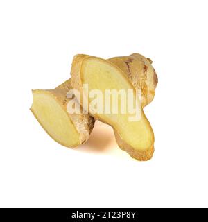 Fresh ginger rhizome with sliced isolated on white background.  Stock Photo