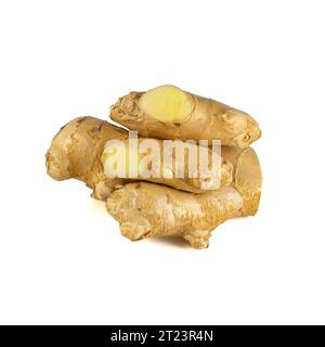 Fresh ginger rhizome with sliced isolated on white background.  Stock Photo