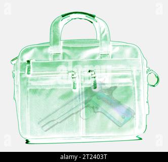 Xray image of briefcase contains a gun Stock Photo