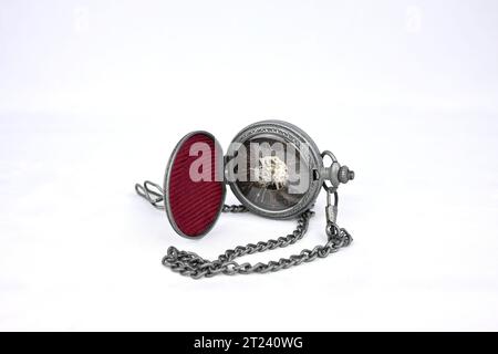 A vintage pocket watch isolated on a white background Stock Photo